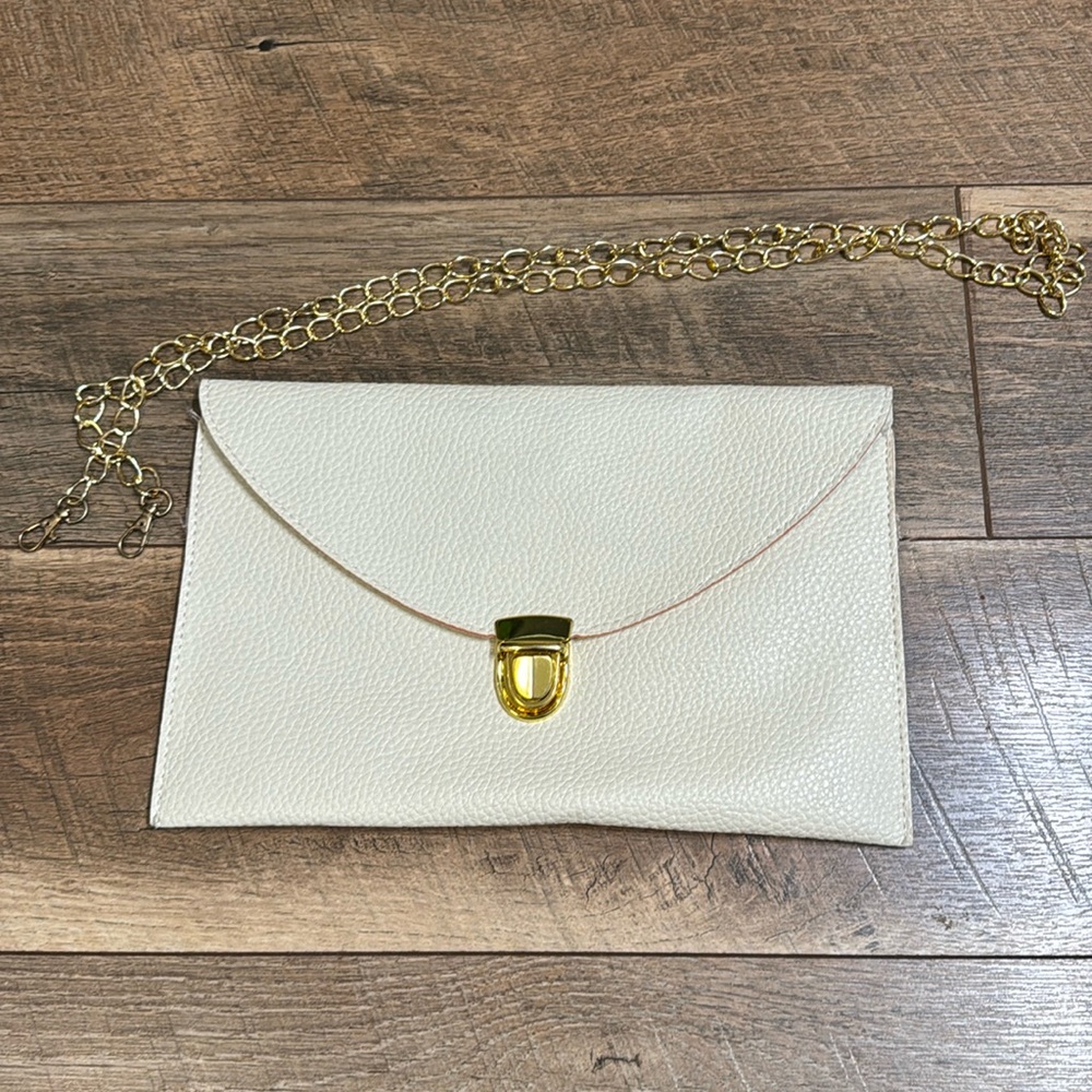 Cream crossbody clutch